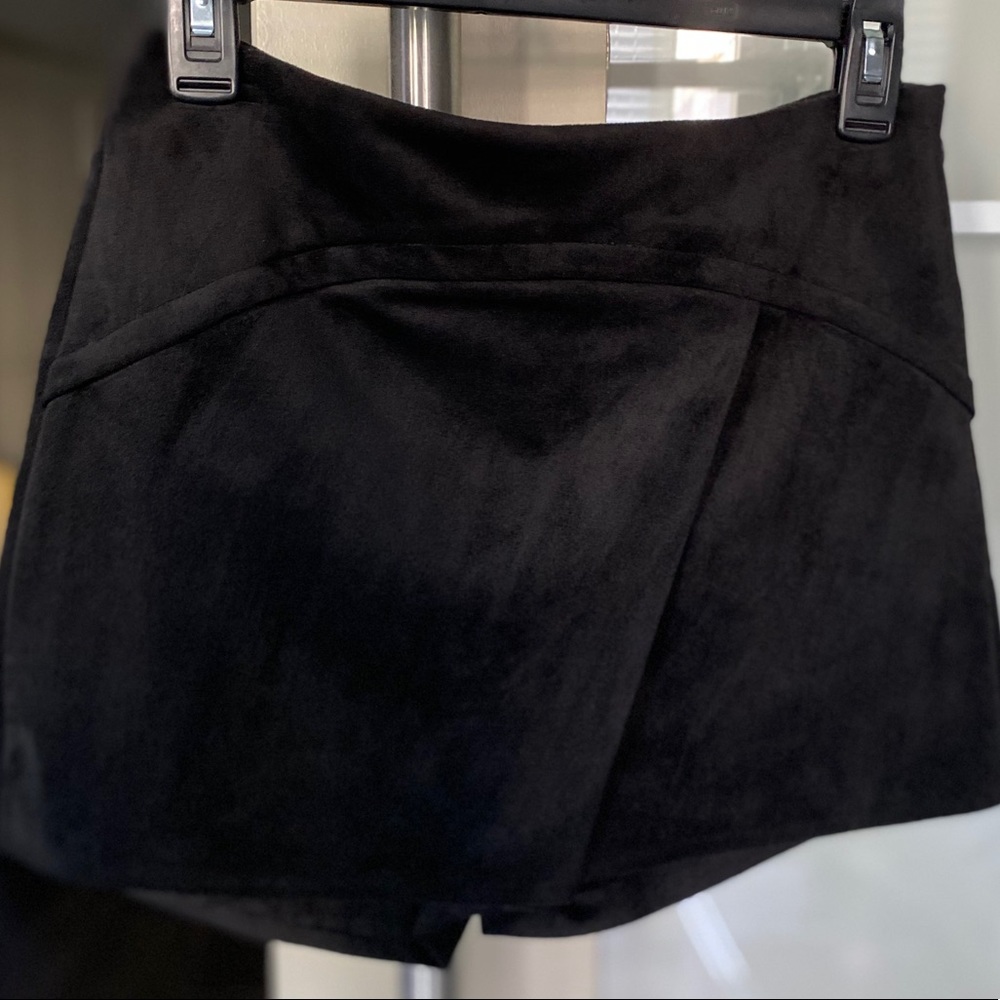 New BCBG black suede like shorts, fully lined.